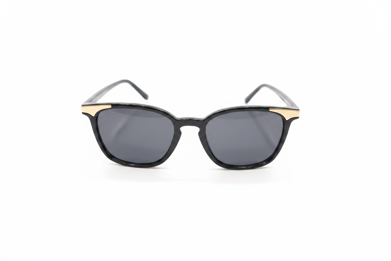 Black gold cat-eye sunglasses on white background