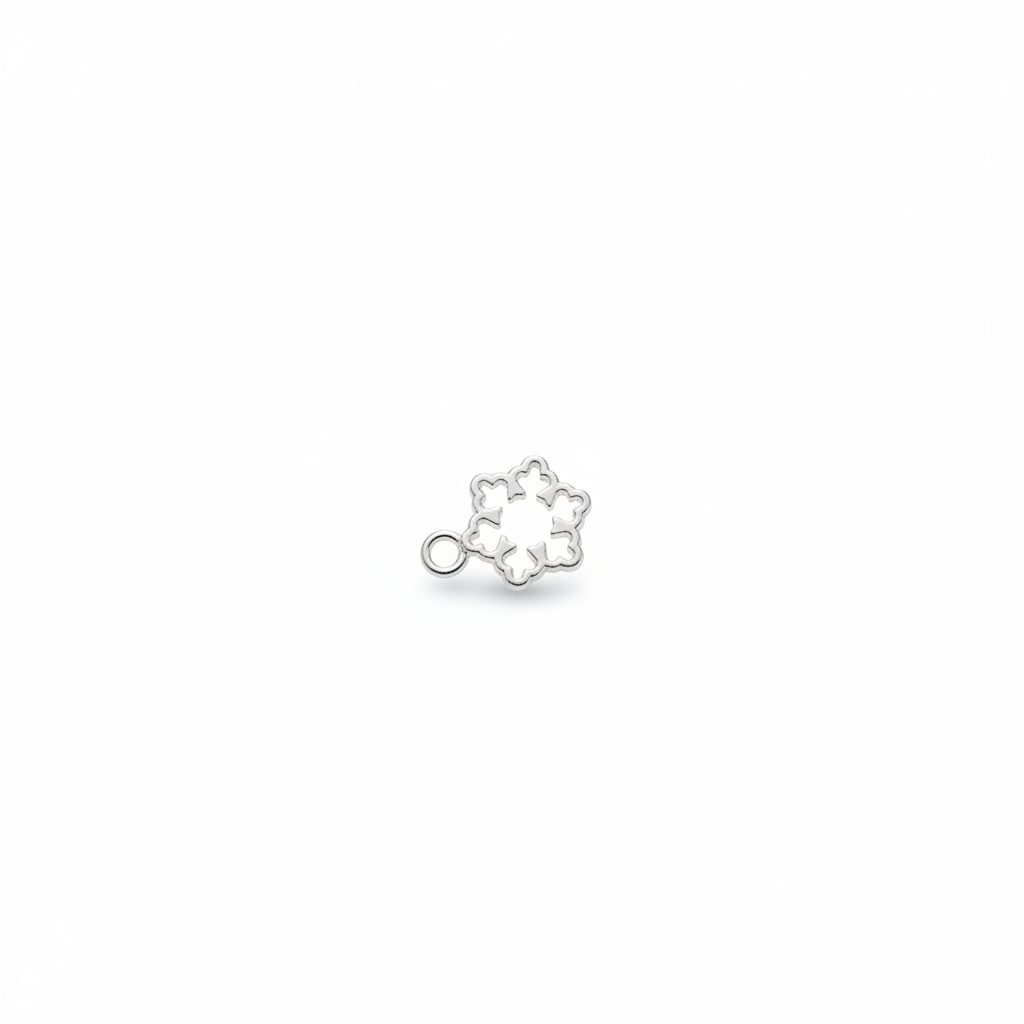 Silver snowflake charm on white background