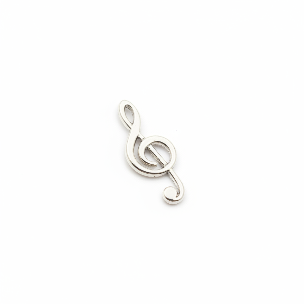 Silver treble clef charm on white background